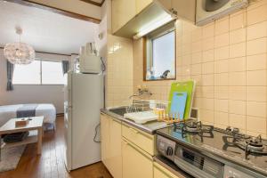 Kuchyň nebo kuchyňský kout v ubytování Uhome Ueno Apartment 4