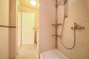 Kúpeľňa v ubytovaní Apartment City Center + 20 fotografií