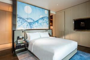 Voodi või voodid majutusasutuse MGM Cotai toas