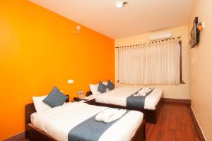 Katil atau katil-katil dalam bilik di Hotel Green Horizon