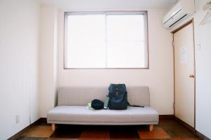 Posezení v ubytování Y Pub & Hostel Tottori