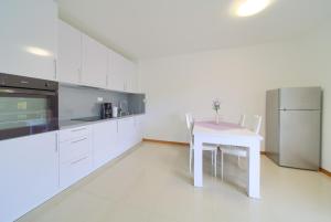 Kuchyň nebo kuchyňský kout v ubytování Adria House