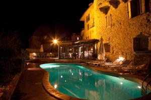 Bazén v ubytování Relais La Fattoria nebo v jeho okolí