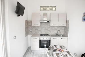 Kuchyňa alebo kuchynka v ubytovaní Central Luxury Apartment