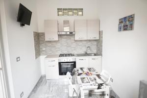 Kuchyňa alebo kuchynka v ubytovaní Central Luxury Apartment