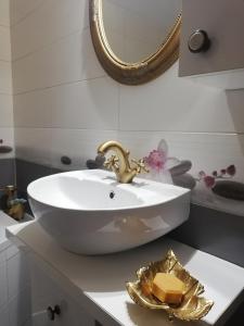 Een badkamer bij Maison Rosmina
