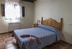 A bed or beds in a room at RuralEcofilabres