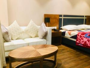 Ένα ή περισσότερα κρεβάτια σε δωμάτιο στο Dreamial Element One Studio @ Sector 47 Gurgaon