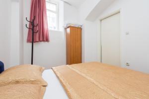 Postel nebo postele na pokoji v ubytování Apartment Pauk Split