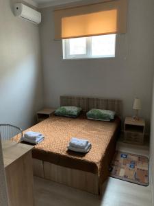 Postel nebo postele na pokoji v ubytování Galian Hotel