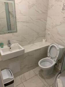 Koupelna v ubytování Galian Hotel