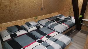 Letto o letti in una camera di Chata Tanvaldský Špičák
