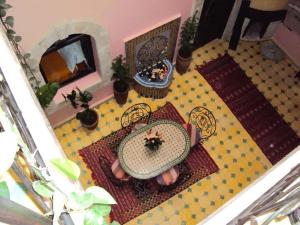 TV a/nebo společenská místnost v ubytování Riad Etoile D'essaouira