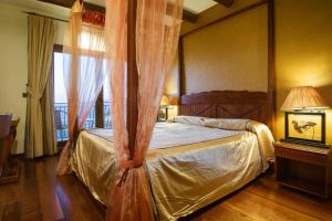 Postel nebo postele na pokoji v ubytování Hotel & Spa Sierra de Cazorla 4*