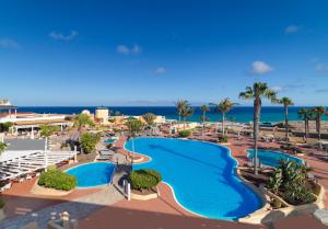 an aerial view of a resort with two pools at H10 Playa Esmeralda - Adults Only in Costa Calma