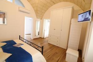 Posteľ alebo postele v izbe v ubytovaní Glenda Historic House in Otranto