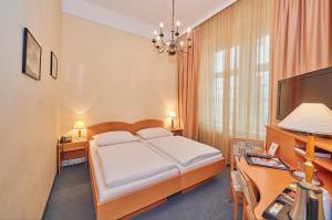 Voodi või voodid majutusasutuse Hotel Zipser toas