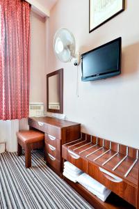 TV a/nebo společenská místnost v ubytování Oliver Hotel + 22 fotografií