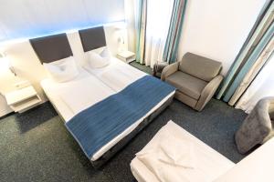 Postel nebo postele na pokoji v ubytování Hotel Wandinger Hof by Lehmann Hotels