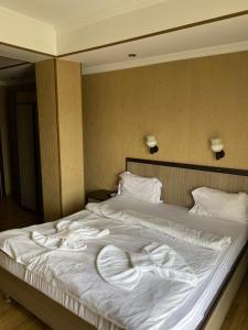 Postel nebo postele na pokoji v ubytování 7 Baits Hotel