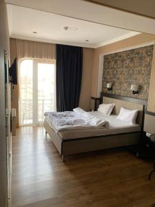 Postel nebo postele na pokoji v ubytování 7 Baits Hotel