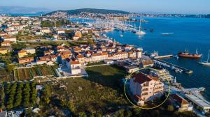 an aerial view of a city with a marina at Kaja - right next to the beach in Trogir