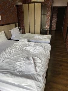 Postel nebo postele na pokoji v ubytování 7 Baits Hotel