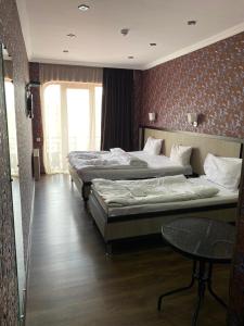 Postel nebo postele na pokoji v ubytování 7 Baits Hotel