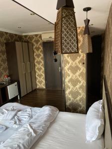 Postel nebo postele na pokoji v ubytování 7 Baits Hotel