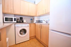 A kitchen or kitchenette at Apartment BELLADONNA