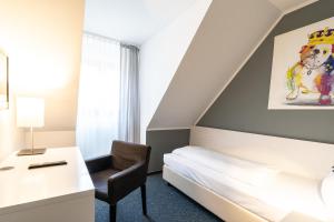 Postel nebo postele na pokoji v ubytování Hotel Wandinger Hof by Lehmann Hotels