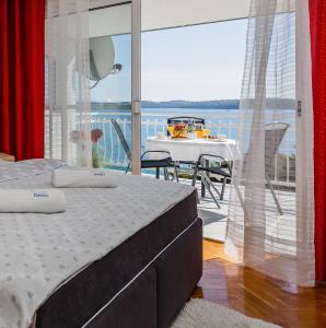 Postel nebo postele na pokoji v ubytování Adriatic Sea View Apartments