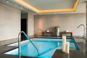 a swimming pool in a hotel room at Hotel Santa Marta in Lloret de Mar