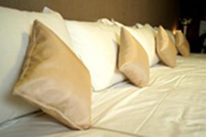 Postel nebo postele na pokoji v ubytování Le Tour Hotel Akihabara Ekimae 楽途ホテル秋葉原駅前店