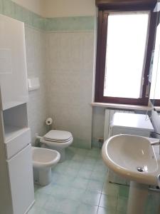 Kúpeľňa v ubytovaní Appartamento Diamantina