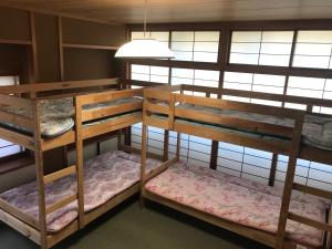 מיטה או מיטות בחדר ב-Gerobal Hostel