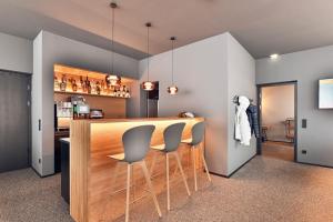 Kuchyň nebo kuchyňský kout v ubytování Warth52-W52 Apartments