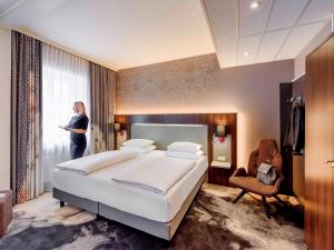 Postel nebo postele na pokoji v ubytování Mercure München am Olympiapark