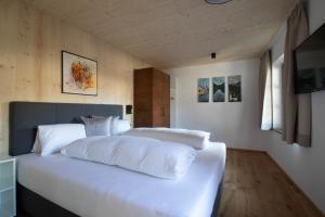 Letto o letti in una camera di Wally Berg-Appartements