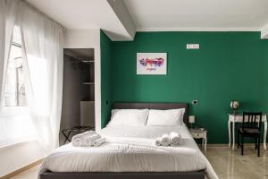 Posteľ alebo postele v izbe v ubytovaní Borgo Santa Lucia B&B
