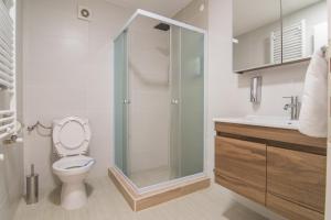 Ванная комната в The ONE Apart Hotel Luxury Suites & Apartments