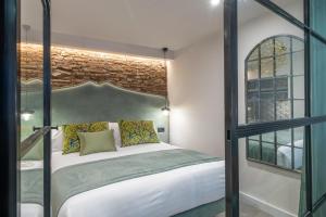Posteľ alebo postele v izbe v ubytovaní Spa del Palacete