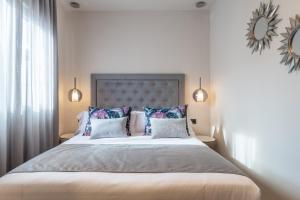 Posteľ alebo postele v izbe v ubytovaní Spa del Palacete