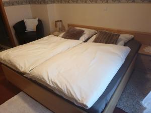 Postel nebo postele na pokoji v ubytování Hotel Eigelstein