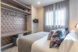 Posteľ alebo postele v izbe v ubytovaní Spa del Palacete