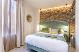 Posteľ alebo postele v izbe v ubytovaní Spa del Palacete