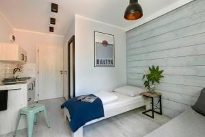 Postel nebo postele na pokoji v ubytování Pokoje i Apartamenty Poddąbie 2