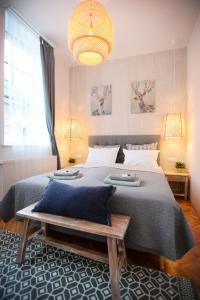 Posteľ alebo postele v izbe v ubytovaní Villa Inda Rooms