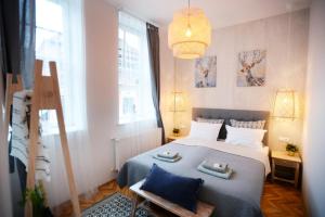 Posteľ alebo postele v izbe v ubytovaní Villa Inda Rooms