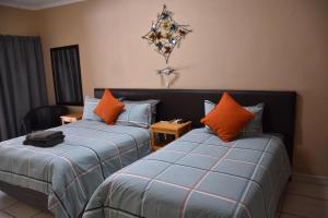Ένα ή περισσότερα κρεβάτια σε δωμάτιο στο Alpine Bed and Breakfast